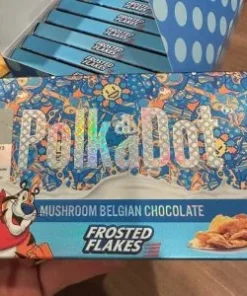 PolkaDot Magic Mushroom Belgian Chocolate Bar Frosted Flakes. This product is a delightful fusion of rich chocolate and the natural goodness of mushrooms. Indulge in the unique taste and texture of this delectable treat that will leave your taste buds craving for more.